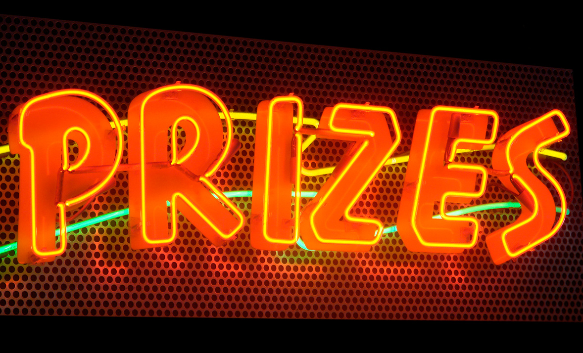 Prizes, a multicolored neon sign
